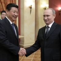 Chinese and Russian ties are a friendship of convenience, and the two nations can only really come together when facing a common enemy such as the West. |  RIA NOVOSTI / KREMLIN / VIA REUTERS