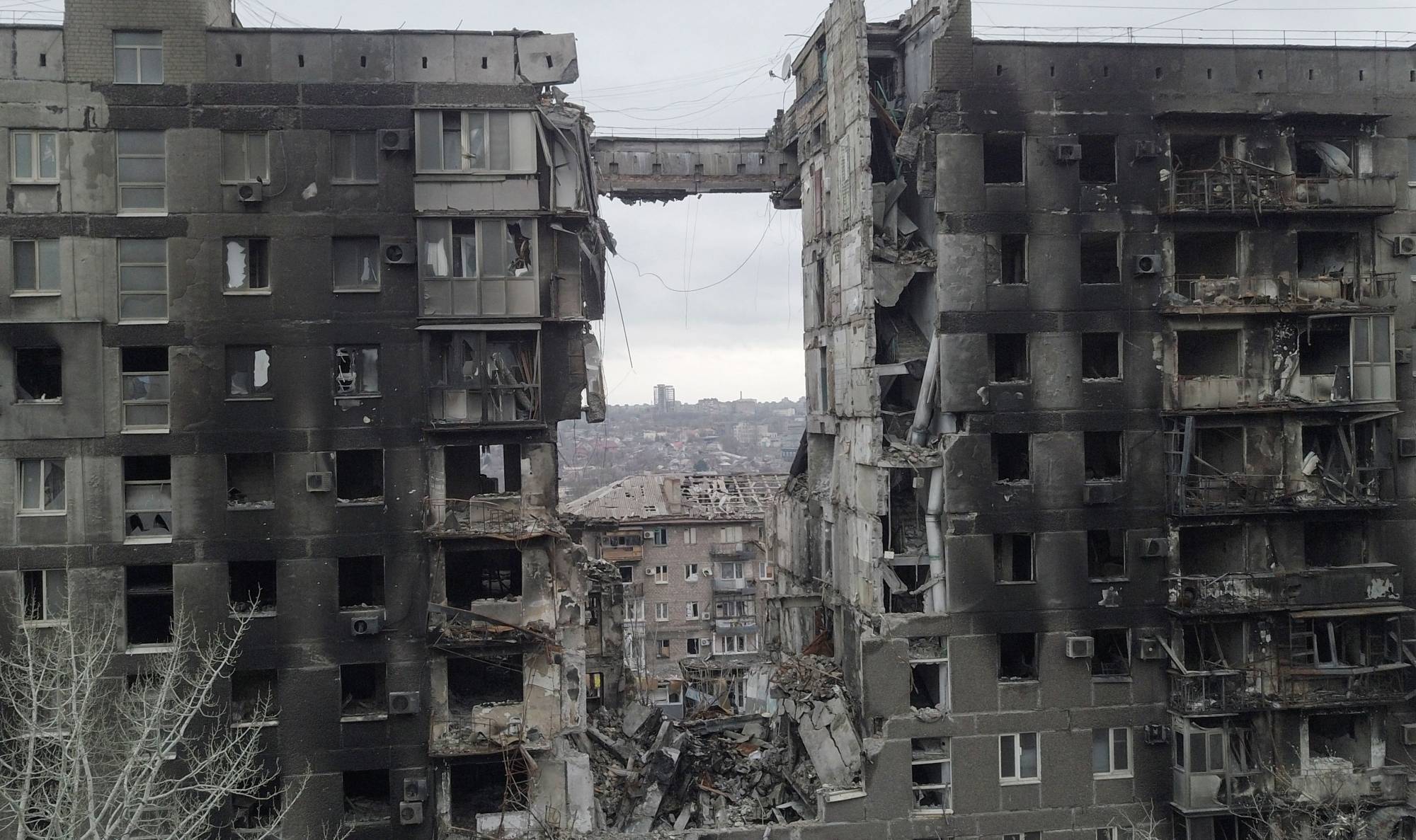 Destroyed residential buildings in the southern port city of Mariupol, Ukraine, on Thursday | REUTERS