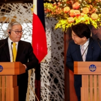 Foreign Minister Yoshimasa Hayashi (right) and Philippine Foreign Secretary Teodoro Locsin hold a news conference during the “two-plus-two” talks in Tokyo on April 9.  | POOL / VIA REUTERS
