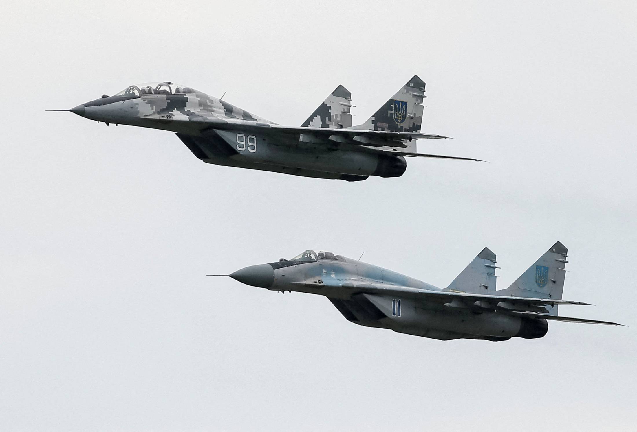 MIG-29 fighter aircrafts fly at a military air base in Vasylkiv, Ukraine, in 2016. | Reuters