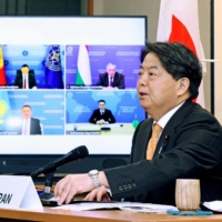 Foreign Minister Yoshimasa Hayashi holds online talks with officials from five Central Asian nations at the Foreign Ministry on Friday. | KYODO
