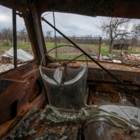 A car destroyed by a military strike in Kukhari, near Kyiv, on Saturday | REUTERS