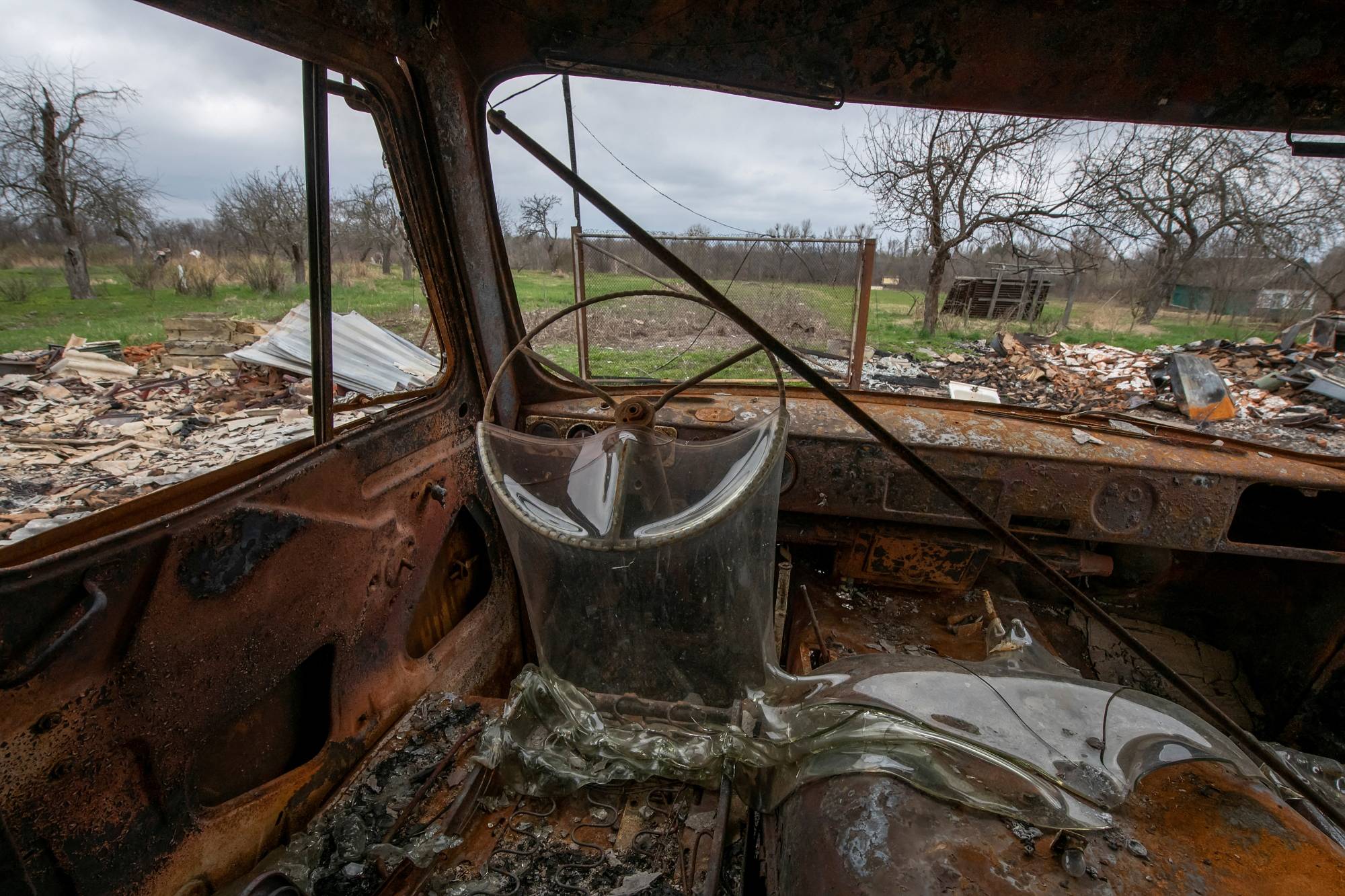 A car destroyed by a military strike in Kukhari, near Kyiv, on Saturday | Reuters
