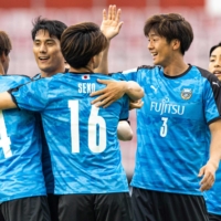 Frontale players celebrate a goal against Guangzhou during their Asian Champions League game in Johor Bahru, Malaysia, on Monday. | ASIAN FOOTBALL CONFEDERATION / VIA AFP-JIJI