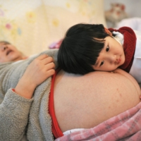 China further loosened its once-strict family-planning rules in 2021, permitting three children per household. The authorities are expected to abandon their population-control policy entirely sometime soon. | CHINA DAILY / VIA REUTERS  