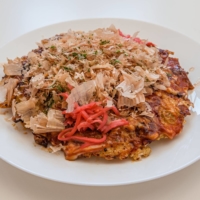 Born in the home kitchens of Osaka, okonomiyaki pancakes are savory treats enjoyed across Japan. | MAKIKO ITOH
