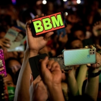 Supporters of Philippine presidential candidate Ferdinand \"Bongbong\" Marcos Jr., also known as BBM, take pictures and videos with their mobile phones during a campaign rally in Lipa, Batangas province, the Philippines, on Wednesday. | REUTERS