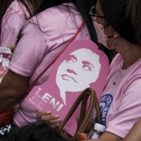 Supporters of Leni Robredo, Philippine vice president, attend a rally inside her campaign headquarters in Quezon City, the Philippines, on April 12. | BLOOMBERG