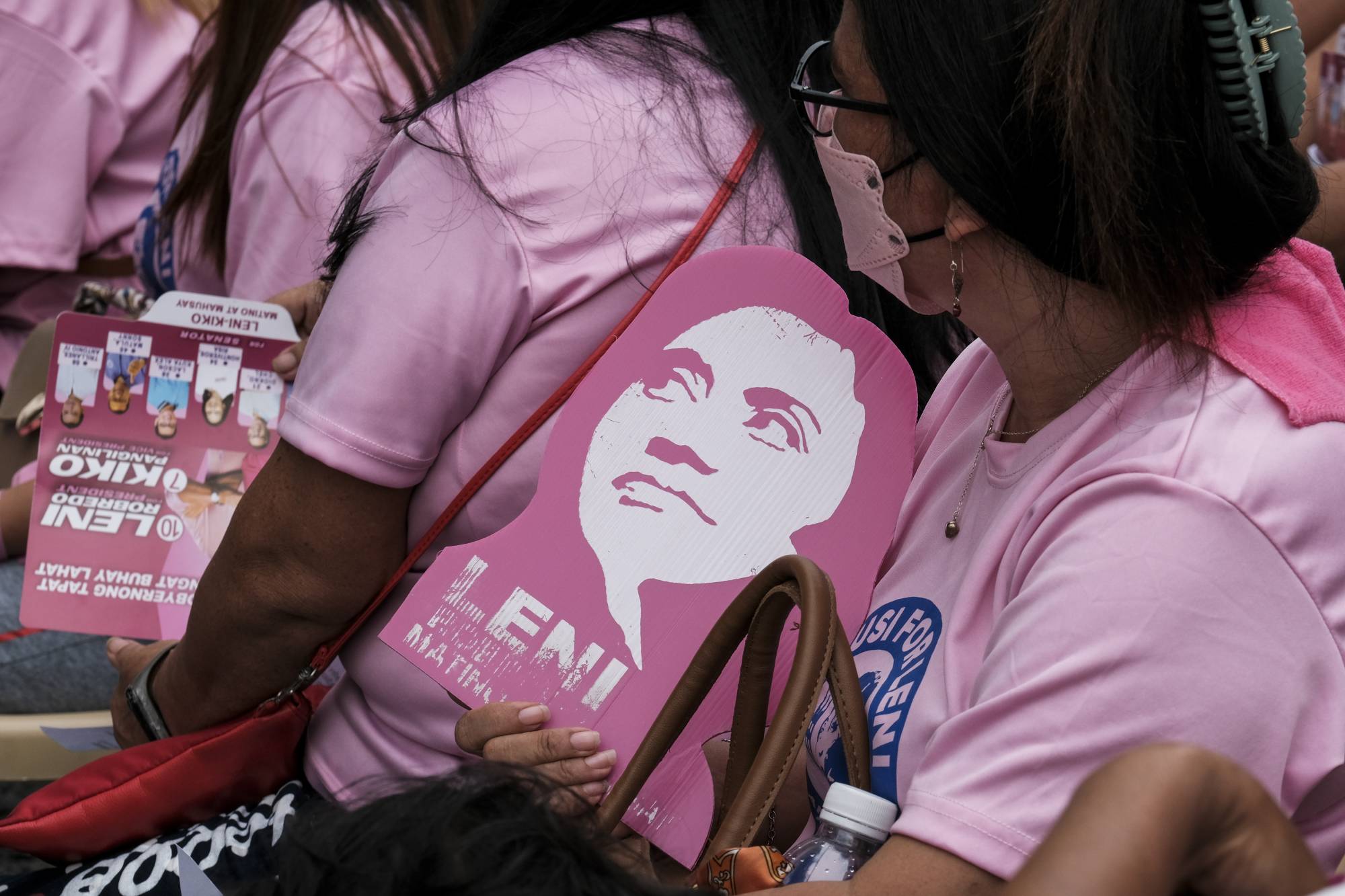 Supporters of Leni Robredo, Philippine vice president, attend a rally inside her campaign headquarters in Quezon City, the Philippines, on April 12. | Bloomberg