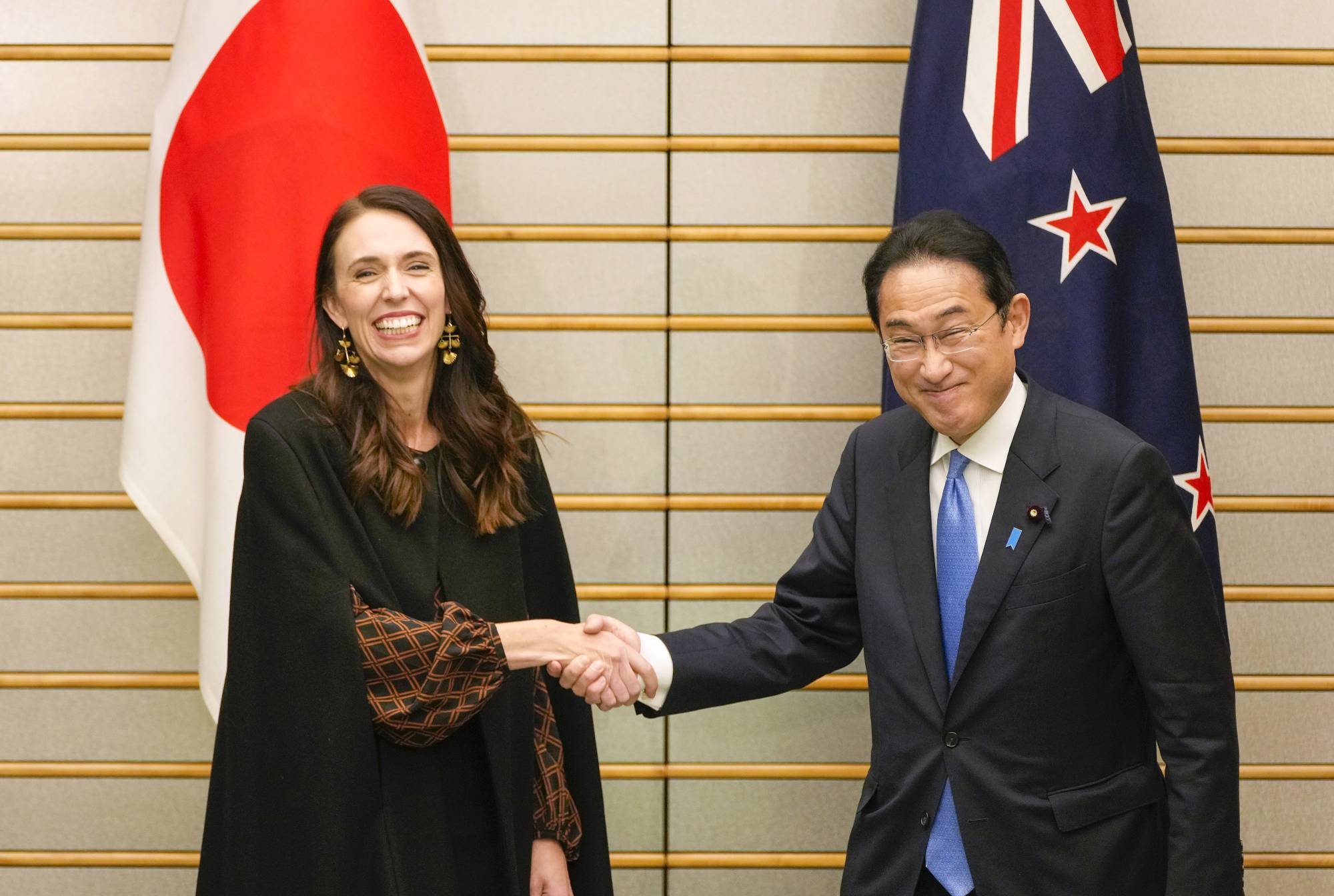 New Zealand Prime Minister Jacinda Ardern and Prime Minister Fumio Kishida during a bilateral meeting in Tokyo on Thursday.  | EPA / VIA BLOOMBERG