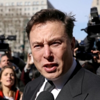 Elon Musk leaves a federal court in New York in 2019. | REUTERS 