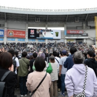 Fans watch the X Games Chiba men\'s street skateboarding final in Chiba on Sunday. Officials are looking toward future events in Japan with confidence despite the weekend’s total attendance of 40,000 falling short of the target of 90,000. | DAN ORLOWITZ 
