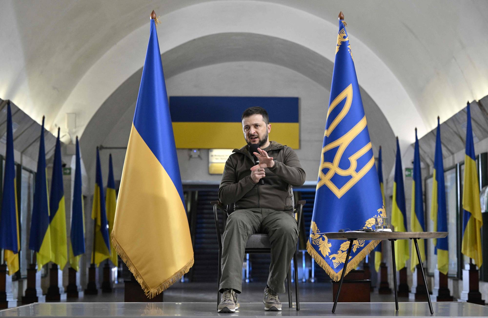 Ukrainian President Volodymyr Zelenskyy addresses a press conference with international media in an underground metro station in Kyiv on Saturday. | AFP-JIJI