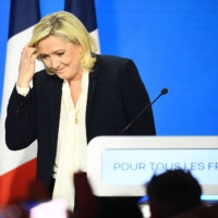French far-right party Rassemblement National presidential candidate Marine Le Pen leaves after her speech at the Pavillon d\'Armenonville in Paris on Sunday. | AFP-JIJI