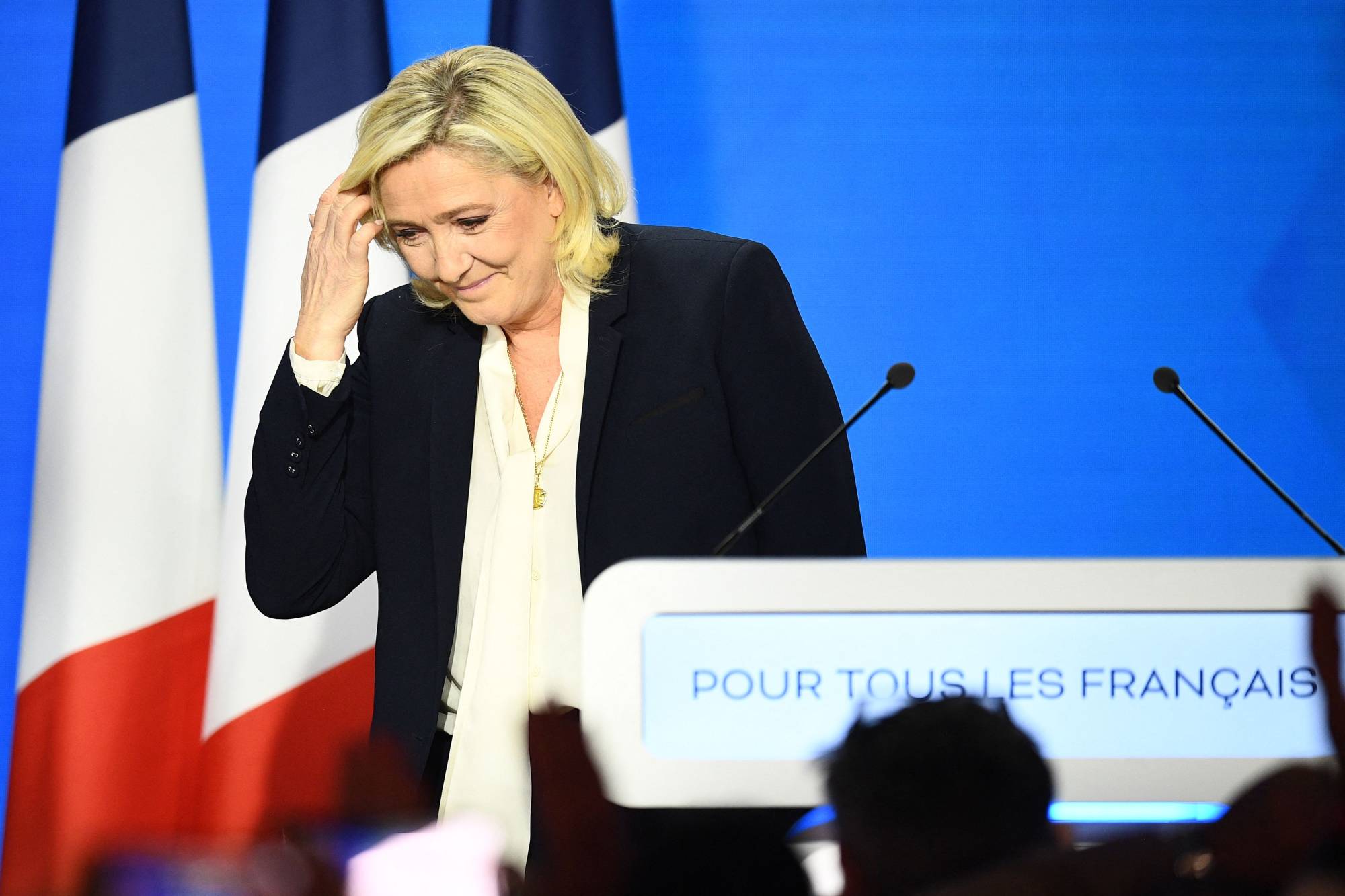 French far-right party Rassemblement National presidential candidate Marine Le Pen leaves after her speech at the Pavillon d'Armenonville in Paris on Sunday. | AFP-JIJI