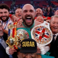 Tyson Fury celebrates after defeating Dillian Whyte via TKO at Wembley Stadium on Saturday. | REUTERS
