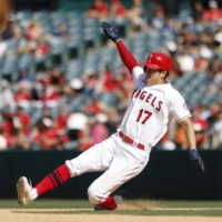 Shohei Ohtani slides into second during the seventh inning of the Angels\' win over the Orioles.  | KYODO