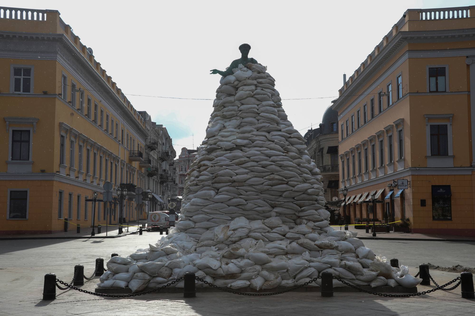 A monument of the city founder Duke de Richelieu is covered with sand bags for protection amid Russia's invasion of Ukraine, in central Odessa on March 9. | REUTERS