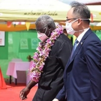 Chinese Ambassador to the Solomon Islands Li Ming (right) and Solomon Islands Prime Minister Manasseh Sogavare attend the opening ceremony of a China-funded national stadium complex in Honiara, Solomon Islands. | AFP-JIJI