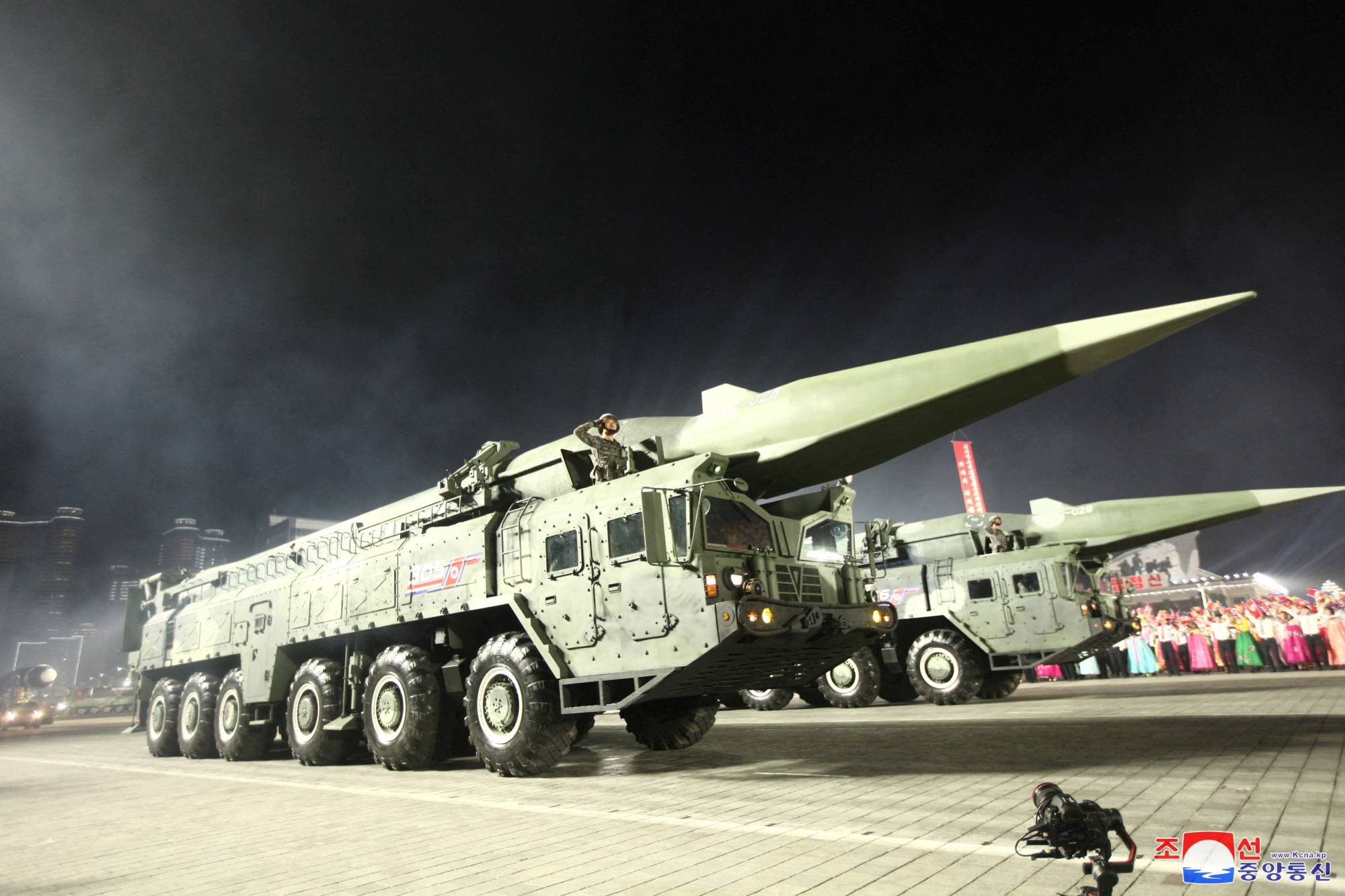 North Korean military vehicles carrying what some observers say are hypersonic glide vehicles are seen during a nighttime military parade to mark the 90th anniversary of the founding of the Korean People's Revolutionary Army in Pyongyang in this undated photo released Tuesday. | KCNA / via REUTERS 