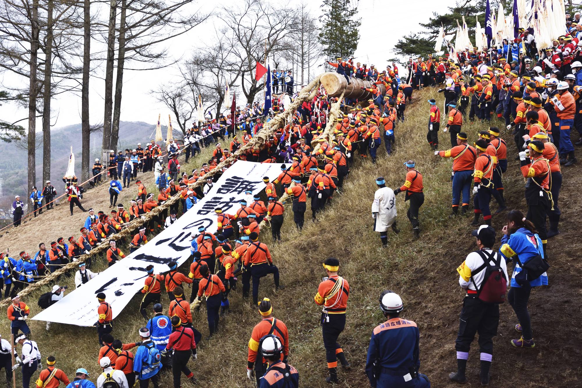 Weighing as much as 12 tons, mighty fir trees become bucking broncos as they slide down steep slopes. | COURTESY OF SHIMOSUWA CITY HALL