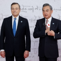 Italian Prime Minister Mario Draghi with Chinese Foreign Minister Wang Yi in Rome in 2021 | REUTERS 