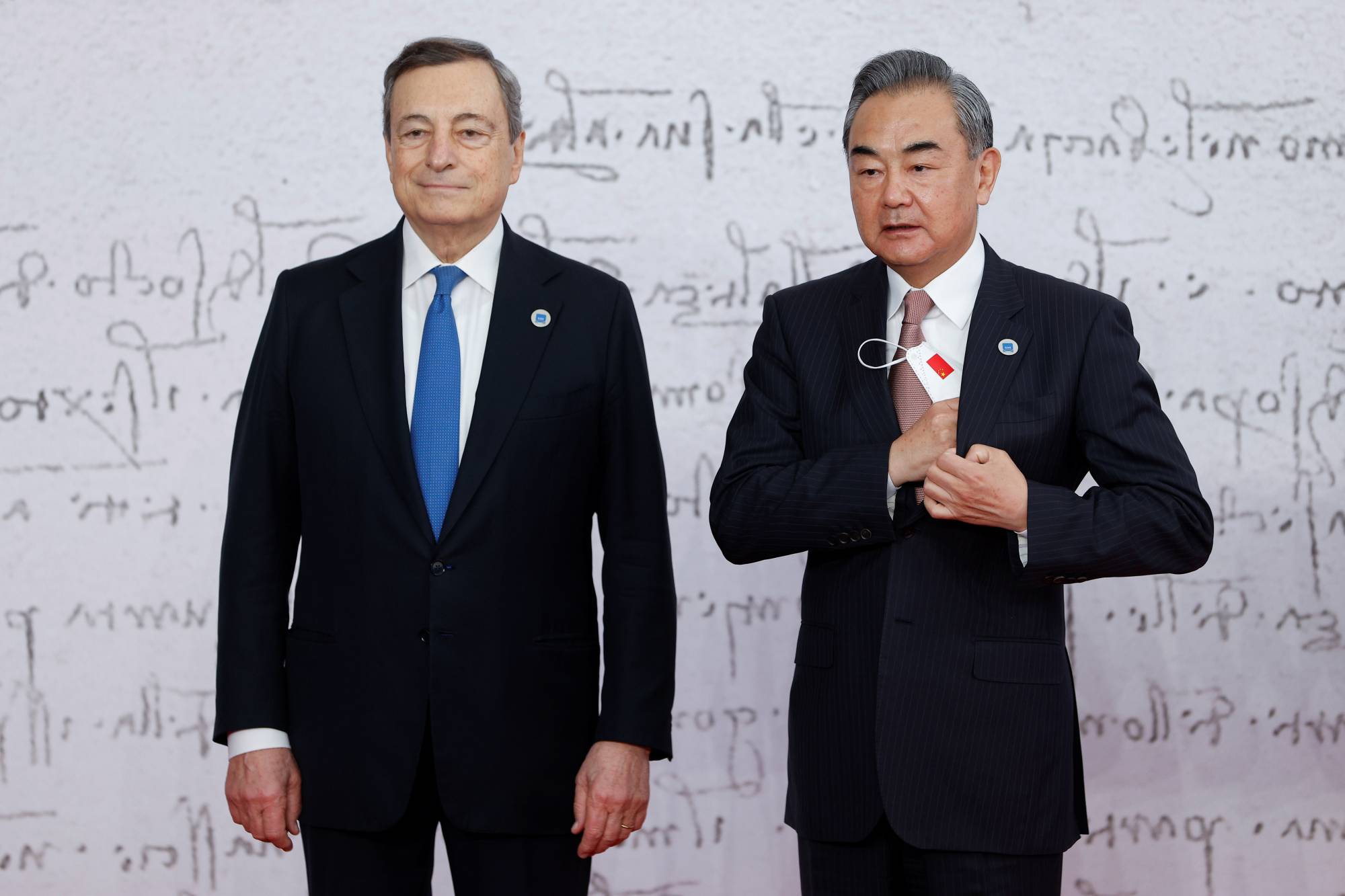 Italian Prime Minister Mario Draghi with Chinese Foreign Minister Wang Yi in Rome in 2021 | Reuters 