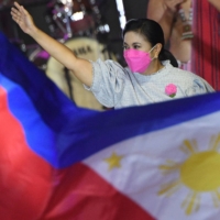 Philippine Vice President and opposition presidential candidate Leni Robredo greets supporters during a campaign rally coinciding with her birthday in Pasay city, suburban Manila, on April 23. | AFP-JIJI