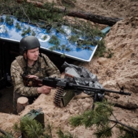 Ukrainian soldiers rest at their position near Lyman, eastern Ukraine, on Thursday, amid Russia\'s invasion of Ukraine. Even before the arrival of the more sophisticated, often longer-range cannons now being fed into the Ukrainian war effort, artillery was key. | AFP-JIJI