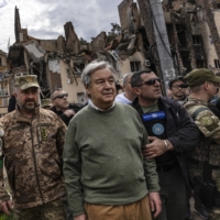 Antonio Guterres, the U.N. secretary-general, visits a destroyed area of the city of Irpin, Ukraine, on Thursday. | DAVID GUTTENFELDER / THE NEW YORK TIMES