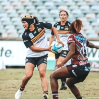Mana Furuta (left) plays for the Brumbies during a match in Canberra in March 2022. | KYODO