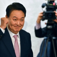 South Korean President-elect Yoon Suk-yeol attends an event in Seoul on March 10. | POOL / VIA REUTERS 