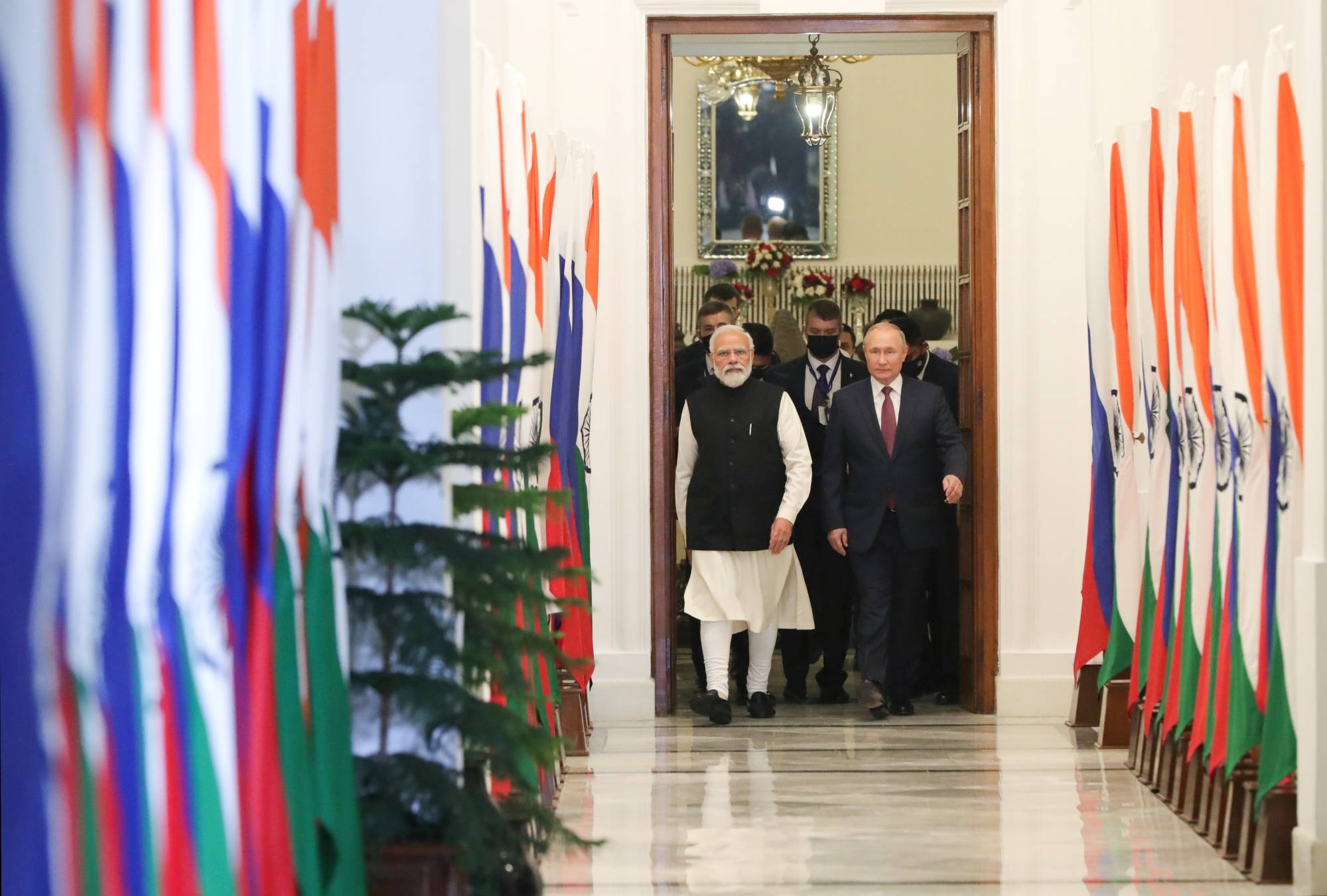 Indian Prime Minister Narendra Modi and Russian President Vladimir Putin meet in New Delhi in December. By taking a neutral stance on Putin's war, geopolitical experts and a former Indian ambassador say, New Delhi has only one country’s interests in mind: India’s. | KREMLIN / VIA REUTERS