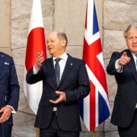 U.S. President Joe Biden, German Chancellor Olaf Scholz and British Prime Minister Boris Johnson at the G7 summit in Brussels on March 24 | REUTERS