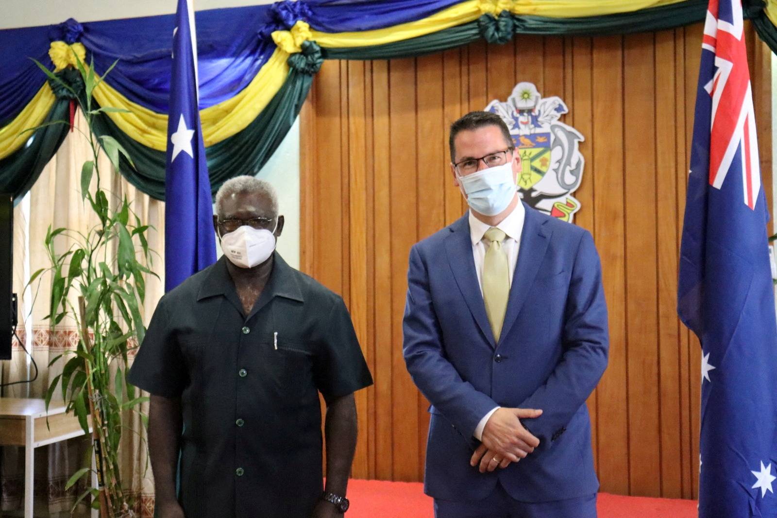 Solomon Islands Prime Minister Manasseh Sogavare (left) and Zed Seselja, Australia's minister for international development and the Pacific, in Honiara, Solomon Islands, on April 13 | DEPARTMENT OF FOREIGN AFFAIRS AND TRADE AUSTRALIA / VIA REUTERS