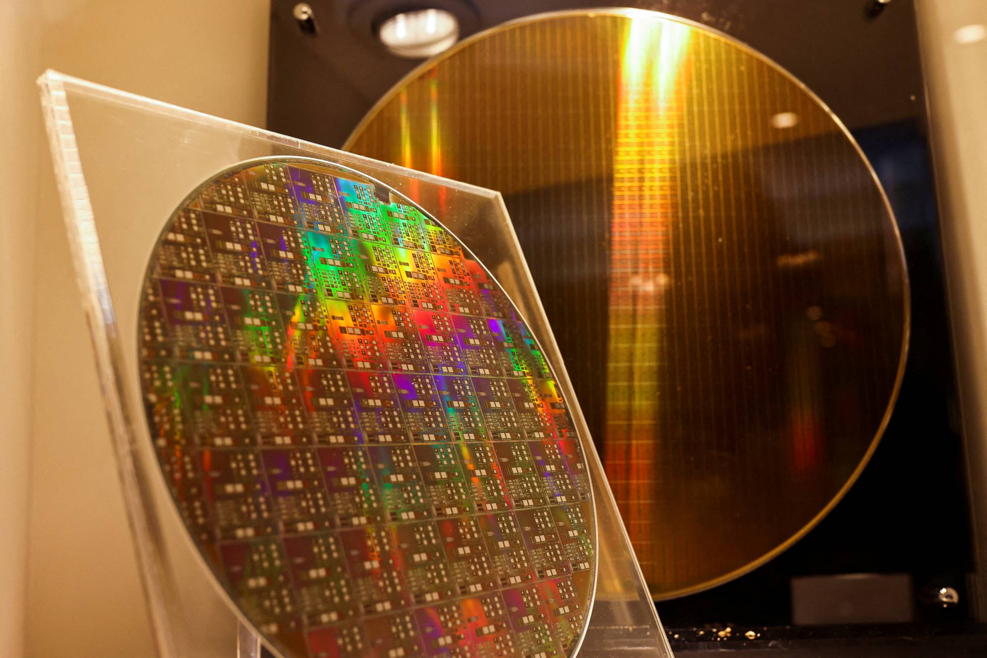 Two chips are displayed at the Taiwan Semiconductor Research Institute (TSRI) in Hsinchu, Taiwan, in February. | REUTERS