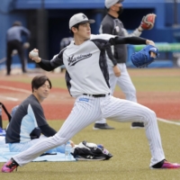 Marines pitcher Roki Sasaki trains at Chiba\'s Zozo Marine Stadium on Monday. | KYODO