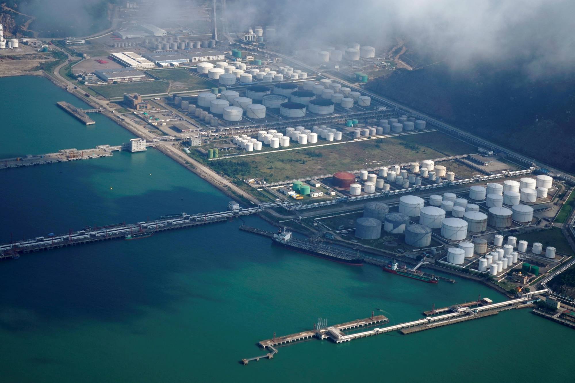 Oil and gas tanks at a port in Zhuhai, China, in October 2018. | REUTERS