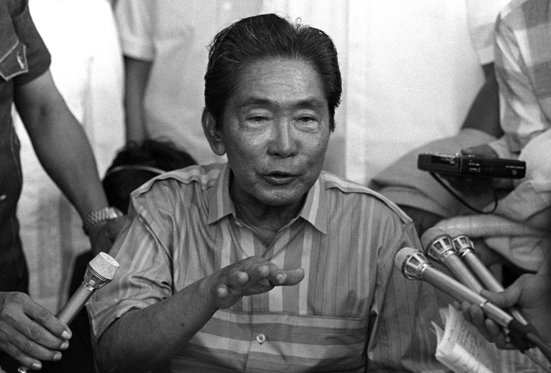 Philippine President Ferdinand Marcos Sr. talks to journalists during his campaign in his northern home province of Ilocos Norte in December 1985. | Reuters 