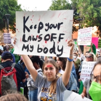 Pro-choice activists gather outside s U.S. courthouse to defend abortion rights in downtown Los Angeles on Tuesday after leaked documents suggest the Supreme Court is poised to strike down the landmark 1973 Roe v. Wade decision. | AFP-JIJI
