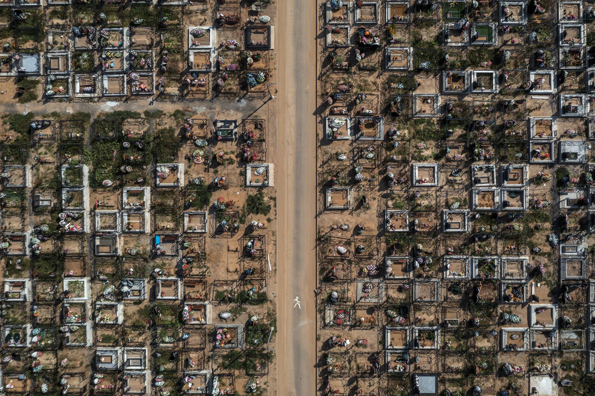 The Butovskoye cemetery in Moscow, one of the burial grounds of COVID-19 victims in Russia, on July 10, 2021. Nearly 15 million more people died during the first two years of the pandemic than would have been expected during normal times, the World Health Organization found. | Sergey Ponomarev / The New York Times