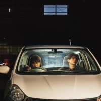 After a night out that goes too far, a middle-aged salesman (Tomomitsu Adachi, left) and his co-worker (Reo Tamaoki, right) are left dealing with a body and a lot of questions in “Drive Into Night.” | © 2021 ‘DRIVE INTO NIGHT’ FILM PARTNERS
