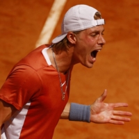 Denis Shapovalov reacts during his Italian Open first-round match against Lorenzo Sonego in Rome on Monday. | REUTERS