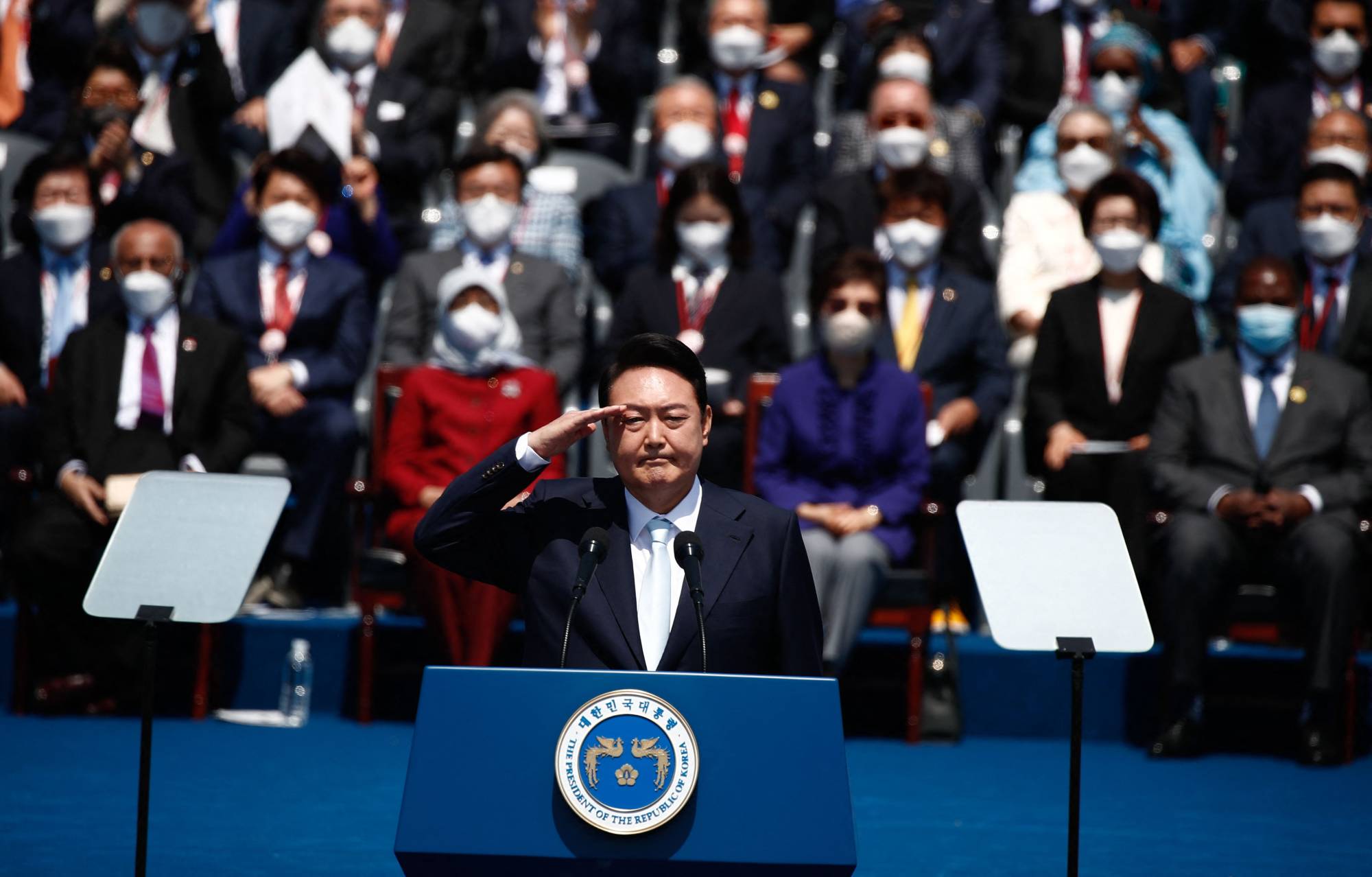 New South Korean President Yoon Suk-yeol takes the oath of office during his inauguration at the National Assembly in Seoul on Tuesday. | POOL / VIA AFP-JIJI
