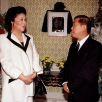 Former Philippine First Lady Imelda Marcos speaks to then-Chinese Ambassador Guan Deng Ming at the Chinese Embassy in Manila in 1997.  | REUTERS 