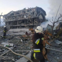 Emergency personnel work near a building damaged after a military strike in Odesa, Ukraine, on Monday. | STATE EMERGENCY SERVICE OF UKRAINE / VIA REUTERS