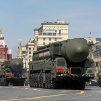Russian military vehicles drive in Red Square during a rehearsal for a military parade marking the anniversary of the victory over Nazi Germany in World War II in central Moscow on Saturday. | REUTERS