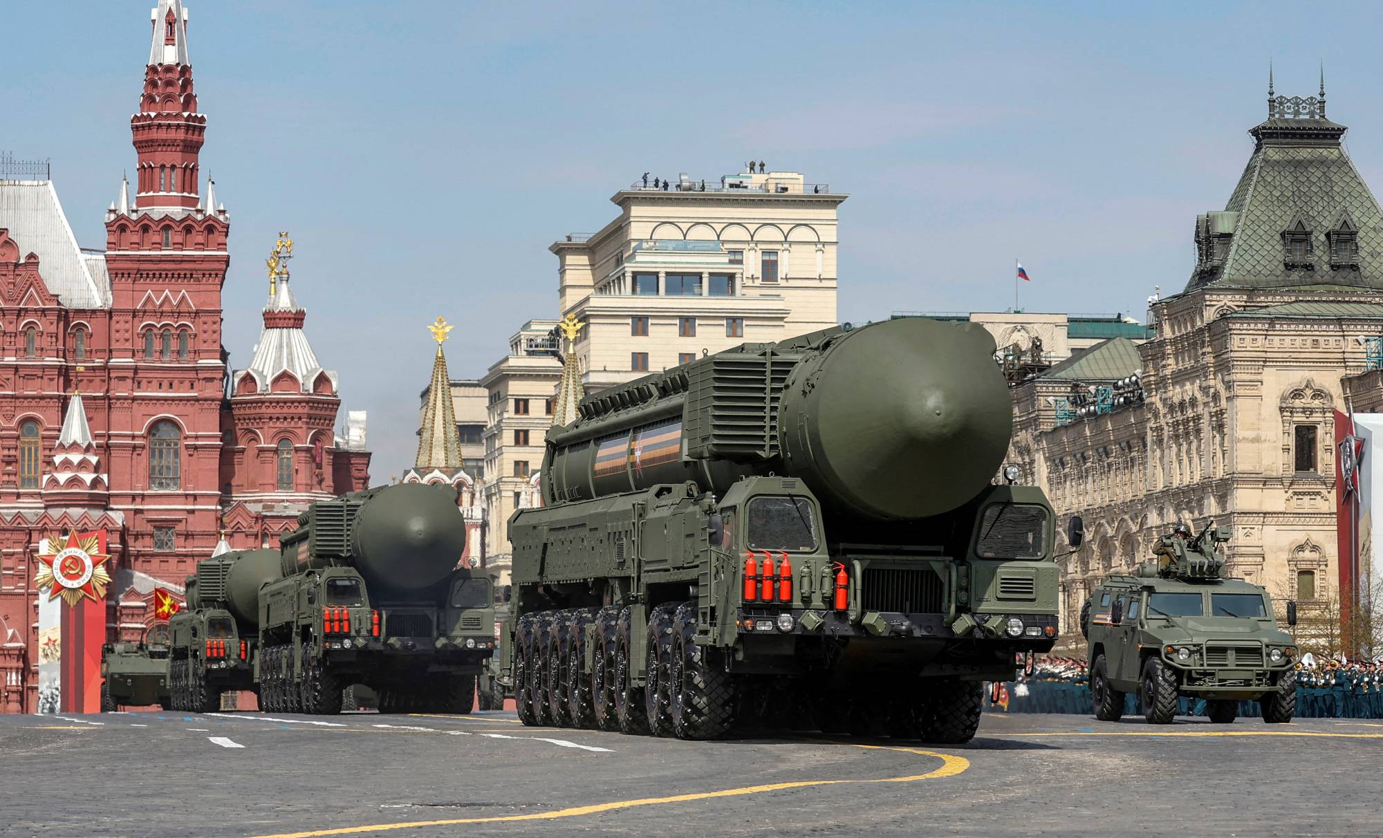 Russian military vehicles drive in Red Square during a rehearsal for a military parade marking the anniversary of the victory over Nazi Germany in World War II in central Moscow on Saturday. | REUTERS