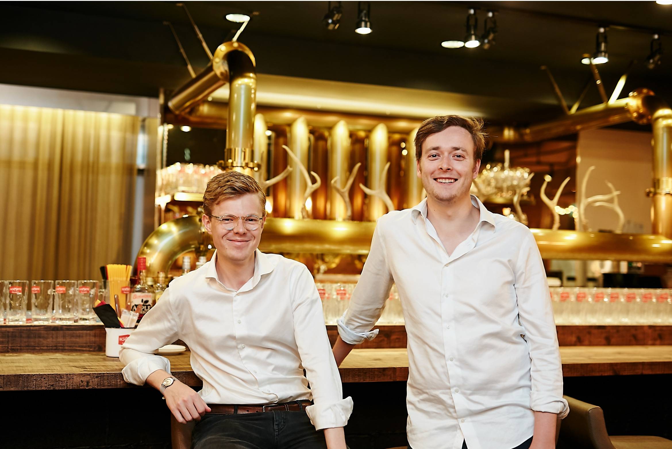 Marc Luetten (left) and Christopher Ax found that German restaurants in Japan tended to play up a traditional and outdated image of their homeland. In response, they set about creating a chain of more modern establishments and the result is Schmatz. | COURTESY OF SCHMATZ