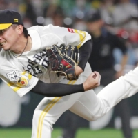 The Hawks\' Nao Higashihama pitches against the Lions at Fukuoka\'s PayPay Dome on Wednesday. Higashihama threw his first no-hitter in SoftBank\'s 2-0 victory. | KYODO